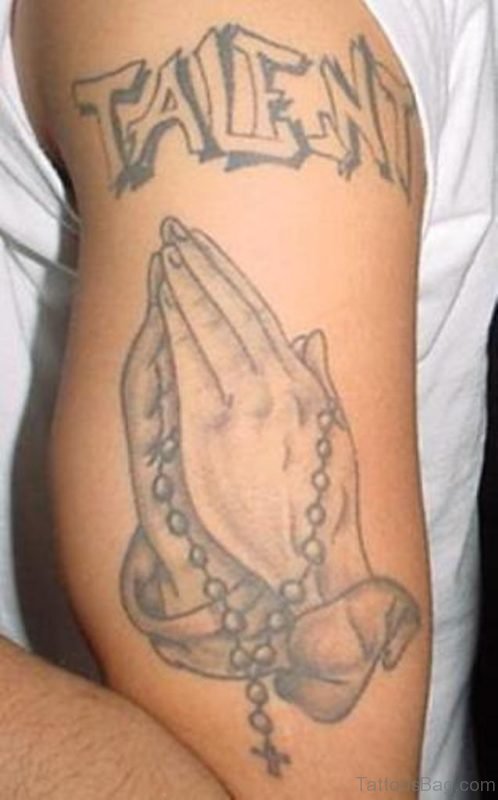Attractive Praying Hands Tattoo On Shoulder