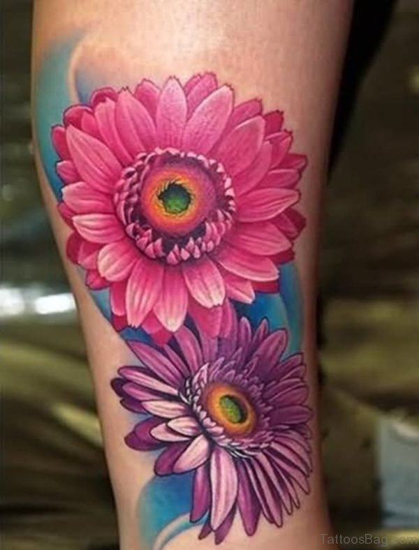 Attractive Two Daisy Flower Tattoo On Leg