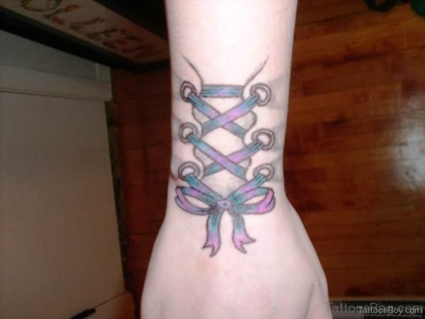 Awesome Bow Tattoo On Wrist