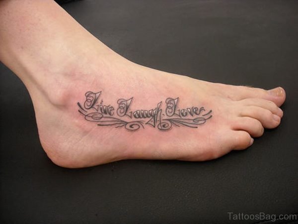 Awesome Wording Tattoo On Foot
