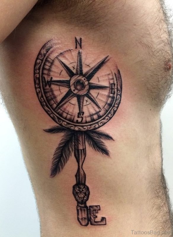 Balck Compass Tattoo On Rib