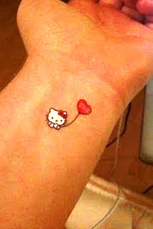 Balloon With Kitty Tattoo On Wrist