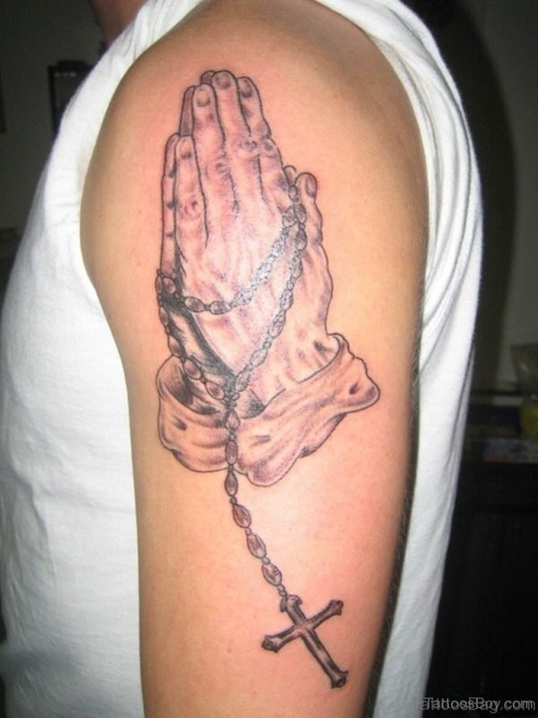 Beautiful Praying Hands Tattoo On Shoulder