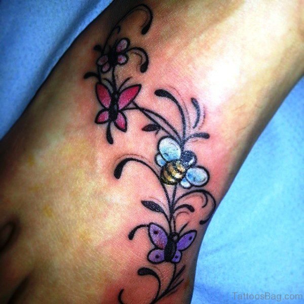 Bee Tattoo With Flowers Design 