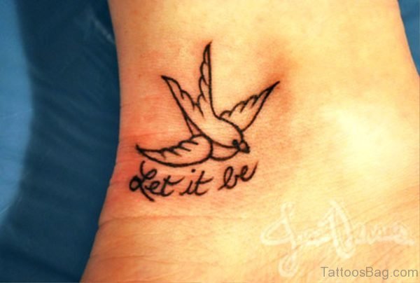 Bird With Let It Be Tattoo On Wrist
