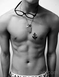 Black Anchor And Sailor Tattoo On Man Chest