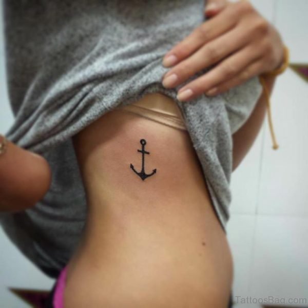 Black Anchor Tattoo On Rib