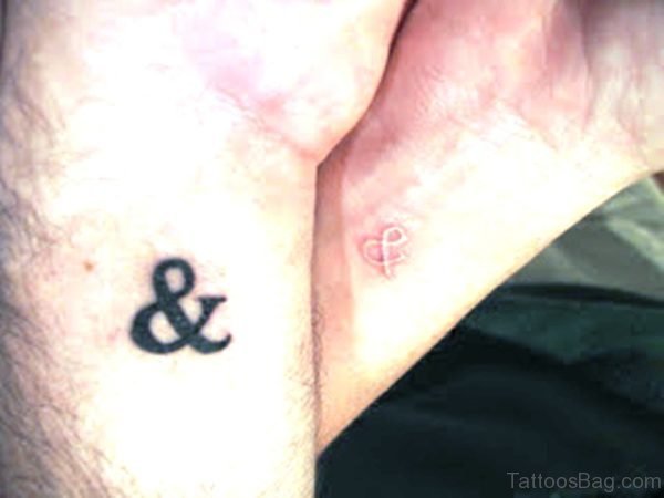 Black And White Ampersand Wrist Tattoo