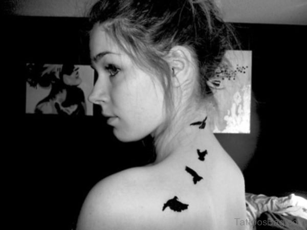 Black And White Birds Tattoo On Neck