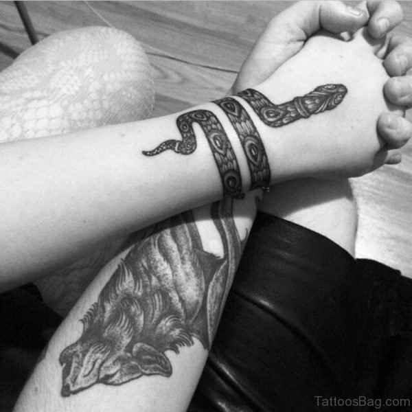 Black And White Snake Wrist Tattoo
