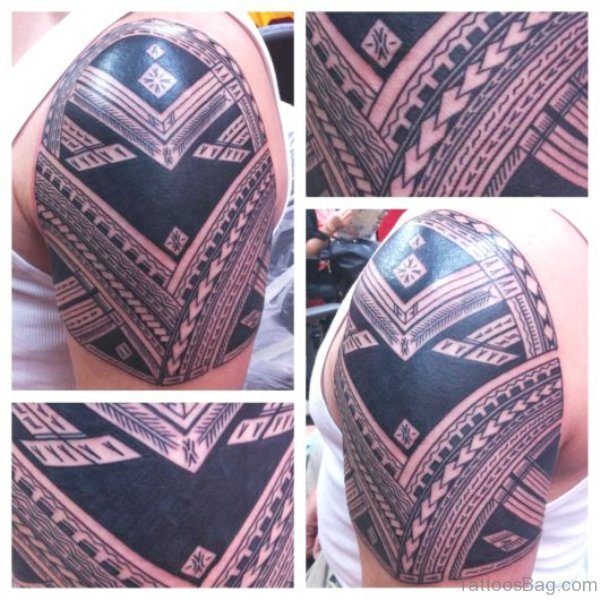 Black Armour Shoulder Tattoo