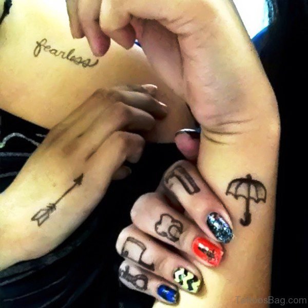 Black Arrow Tattoo Design On Girls