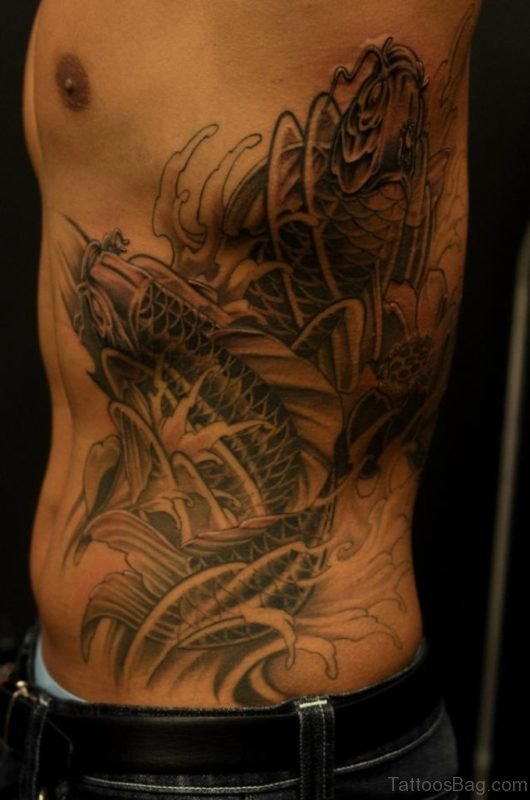 Black Fish Tattoo On Rib