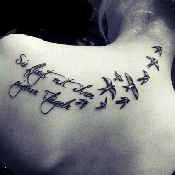 Black Flying Bird Tattoo