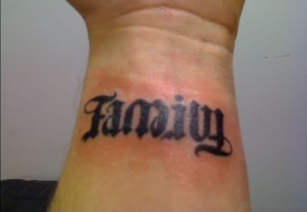 Black Ink Family Ambigram Tattoo On Wrist