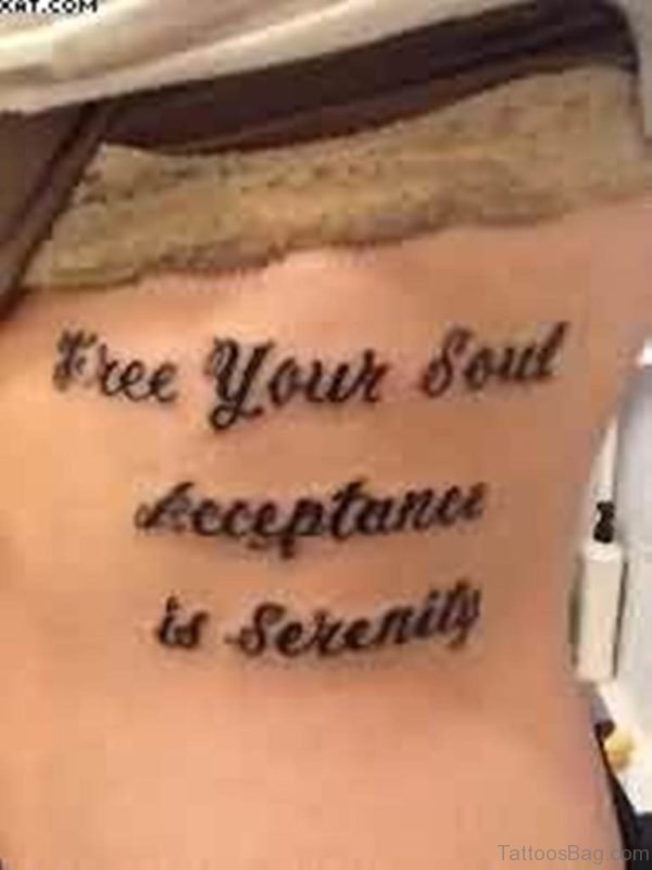 Black Ink Wording Tattoo On Rib Side