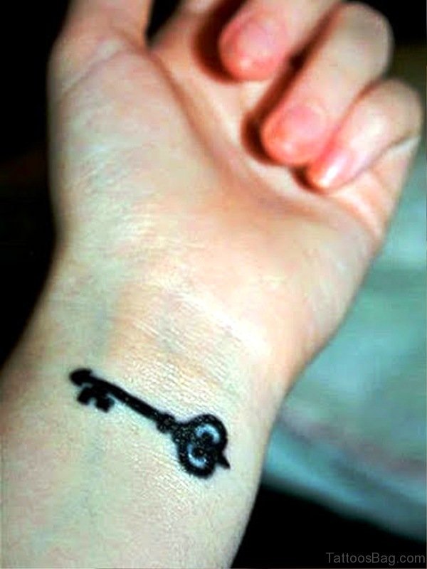 Black Key Wrist Tattoo