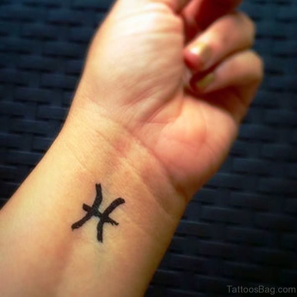 Black Pisces Wrist Tattoo