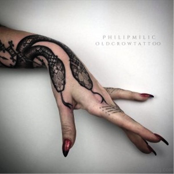 Black Snake Tattoo On Wrist