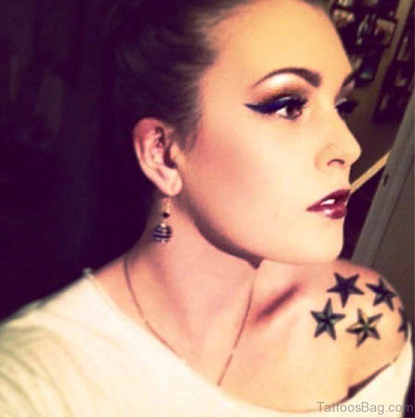 Black Star Shoulder Tattoo