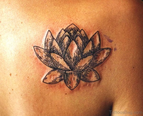 Blade Style Lotus On Shoulder