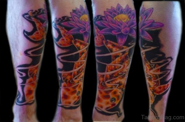 Blue Flower And Fish Tattoo