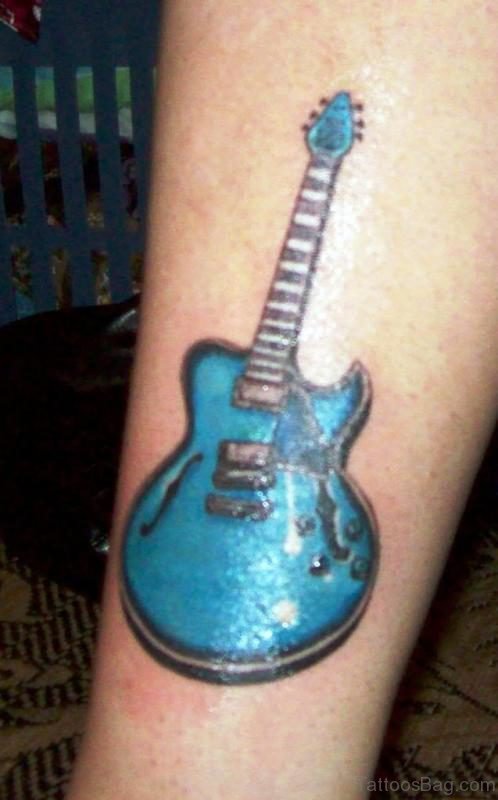 Blue Guitar Tattoo On Forearm