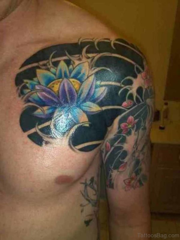 Blue Ink Lotus Chest Tattoo