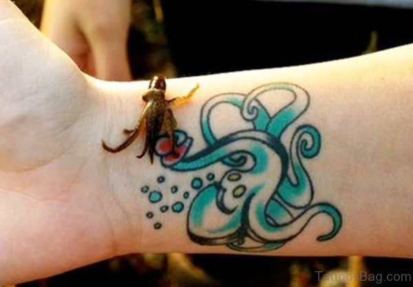 Blue Octopus Tattoo On Wrist
