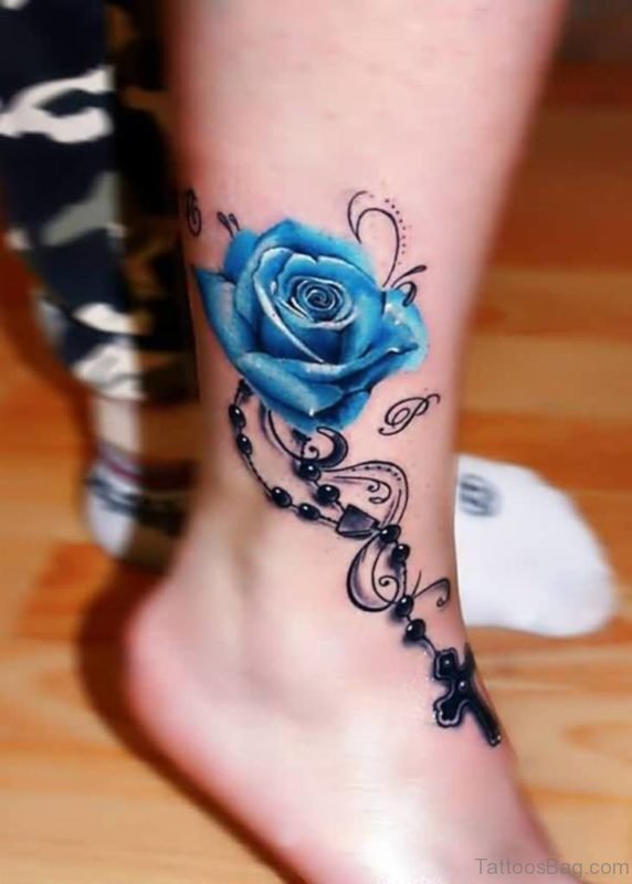 Blue Rose And Cross Tattoo On Ankle