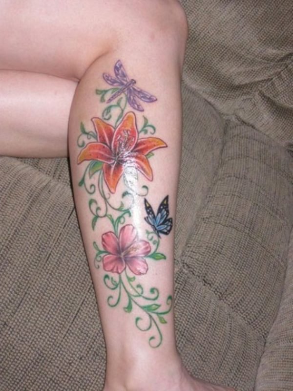 Butterfly And Lily Flower Tattoo On Leg