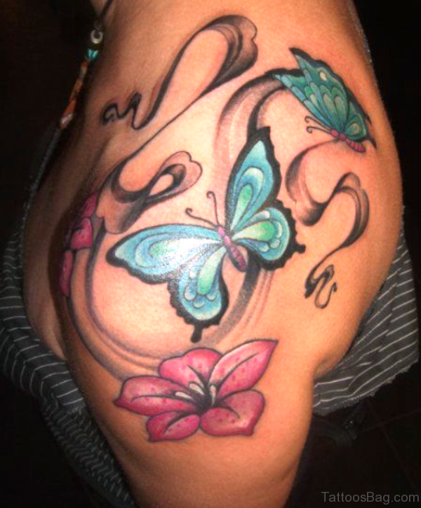 Colored Butterfly Tattoo On Left shoulder