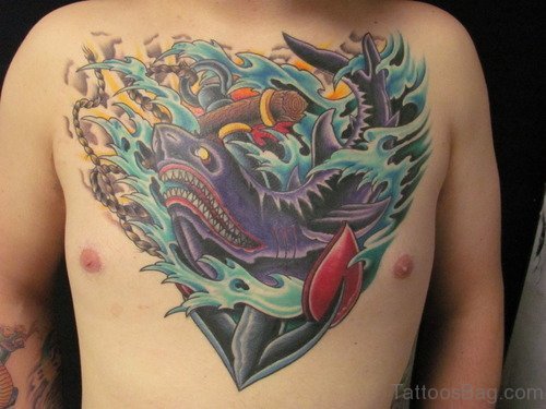 Colored Ink Shark And Anchor Tattoo On Chest