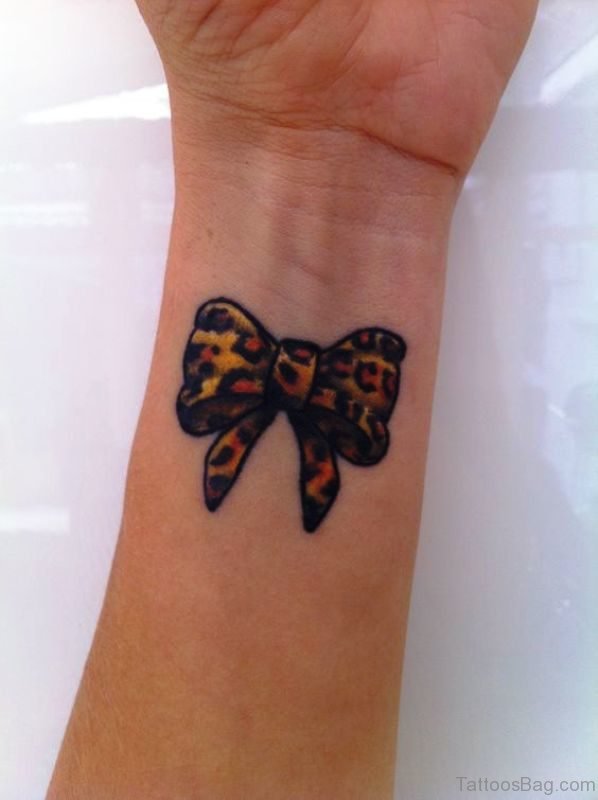 Colorful Bow Tattoo On Wrist