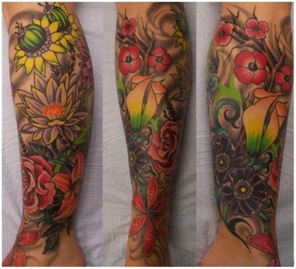 Colorful Flowers Tattoo On Leg