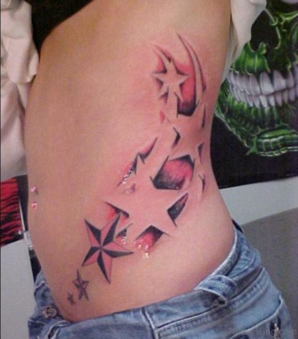 Colorful Star Tattoo On Rib