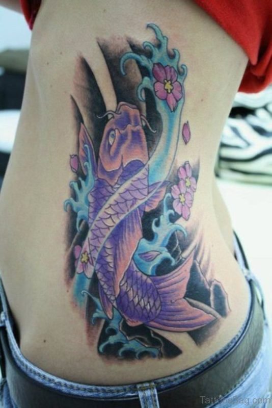 Colourful Koi Fish Tattoo On Rib