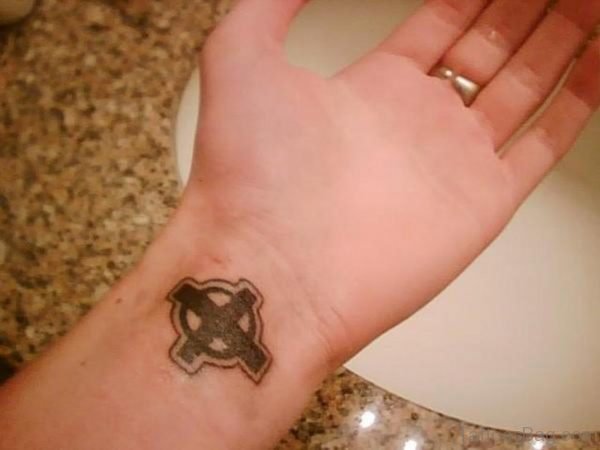 Cross Tattoo On Wrist With Lovely Design