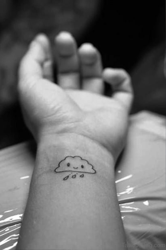 Cute Black And White Tattoo On Wrist 