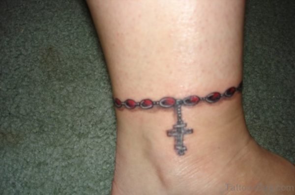 Cute Cross Tattoo On Ankel