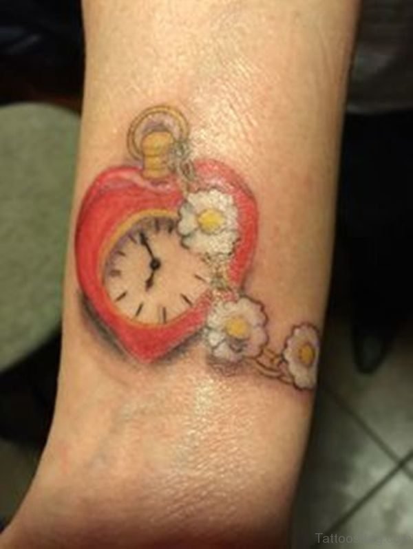 Cute Heart Clock Tattoo On Wrist
