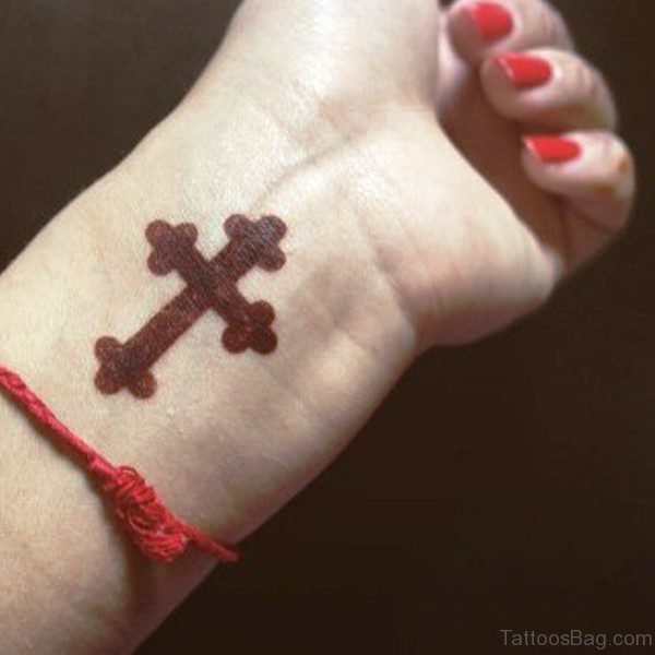 Decent Cross Design Tattoo On Wrist