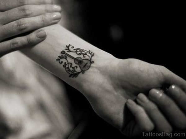 Designer Guitar Tattoo On Wrist