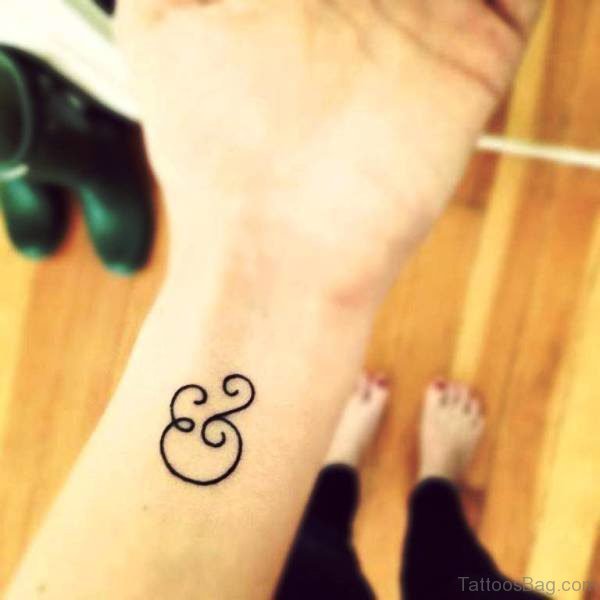Elegant Ampersand Wrist Tattoo