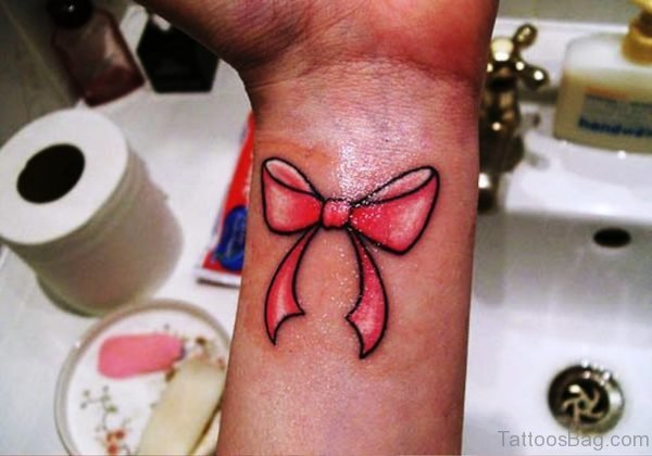 Elegant Bow Tattoo On Wrist