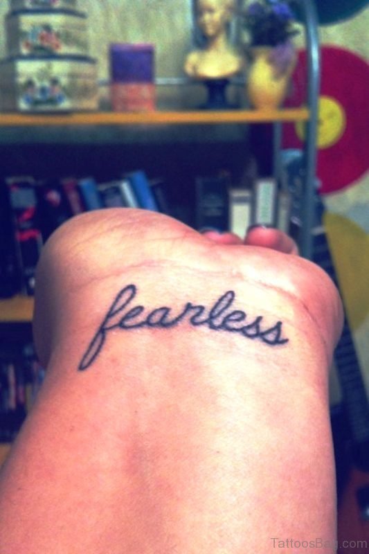 Elegant Fearless Wrist Tattoo