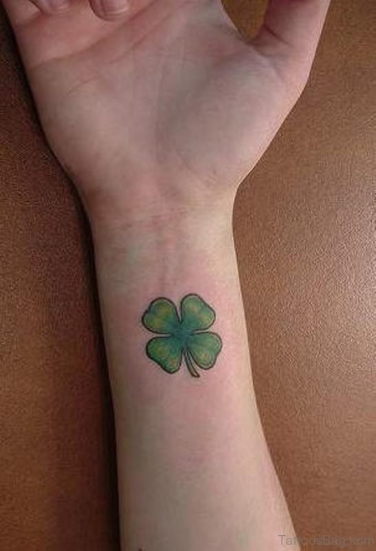 Elegant Four Leaf Tattoo On Wrist