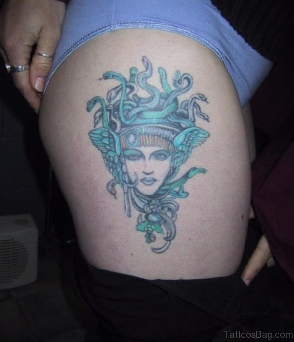 Elegant Medusa Winged Head Tattoo On Thigh