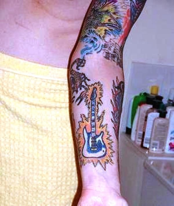 Flaming Guitar Tattoo On Forearm