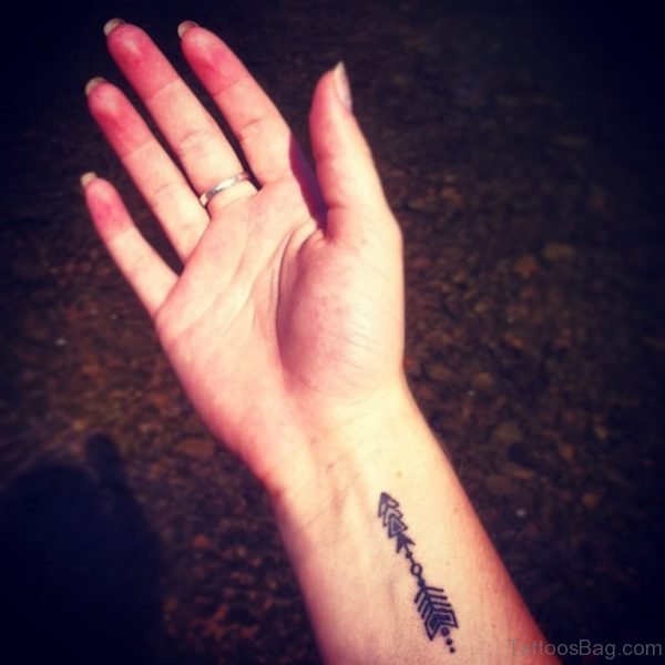 Fresh Black Arrow Tattoo On Wrist